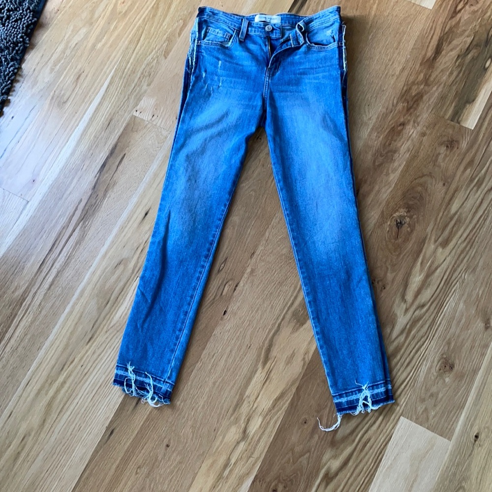Flying monkey skinny blue jeans with dark blue strip down the side and fringe